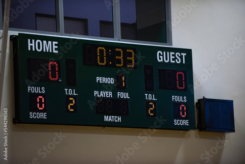 Digital indoor main scoreboard for a volleyball tournament in a gymnasium. Seeing a game about to start soon. photo