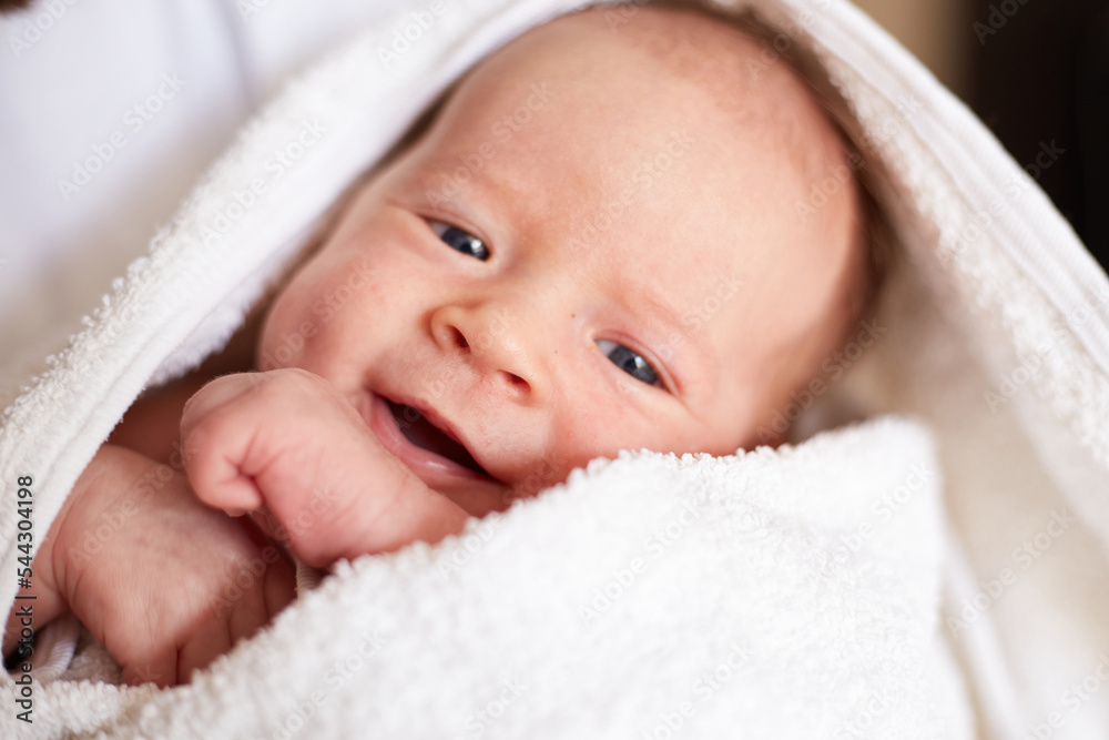 Smiling newborn one month old baby boy. smiling baby Smiling newborn one month old baby boy. smiling baby