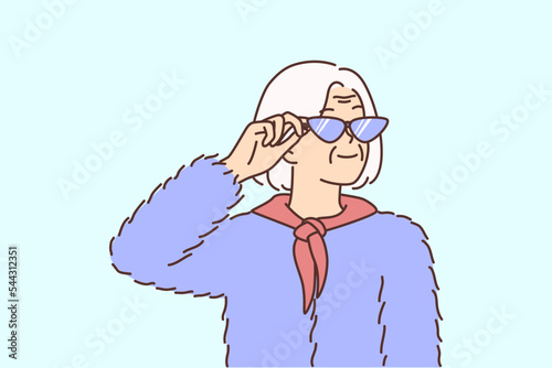 Stylish old woman in fashionable clothes 
