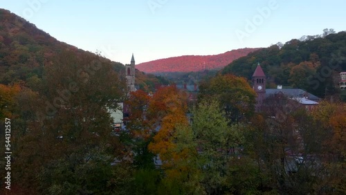 Rising aerial reveal of cute small town in America. Jim Thorpe PA aerial establishing shot in autumn. photo