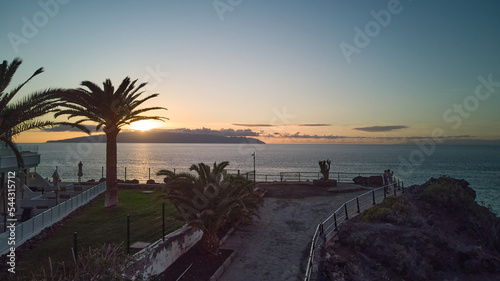 Fototapeta Naklejka Na Ścianę i Meble -  Tenerife coast - sunset over the ocean - aerial photo