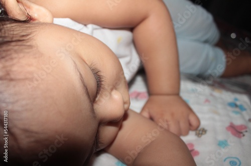 baby sleeping in bed