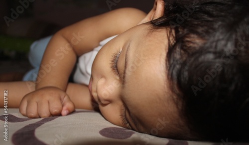 baby sleeping in bed