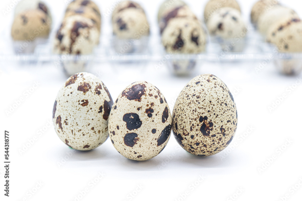 Obraz premium quail eggs on white background