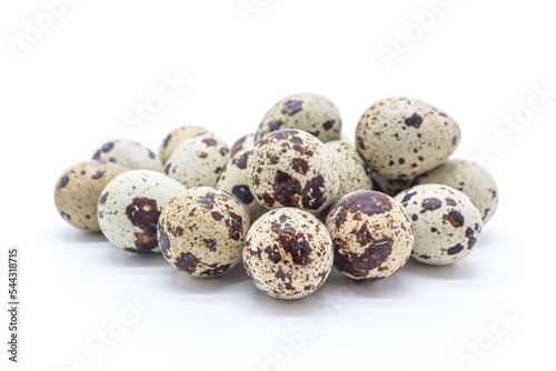 quail eggs on white background photo
