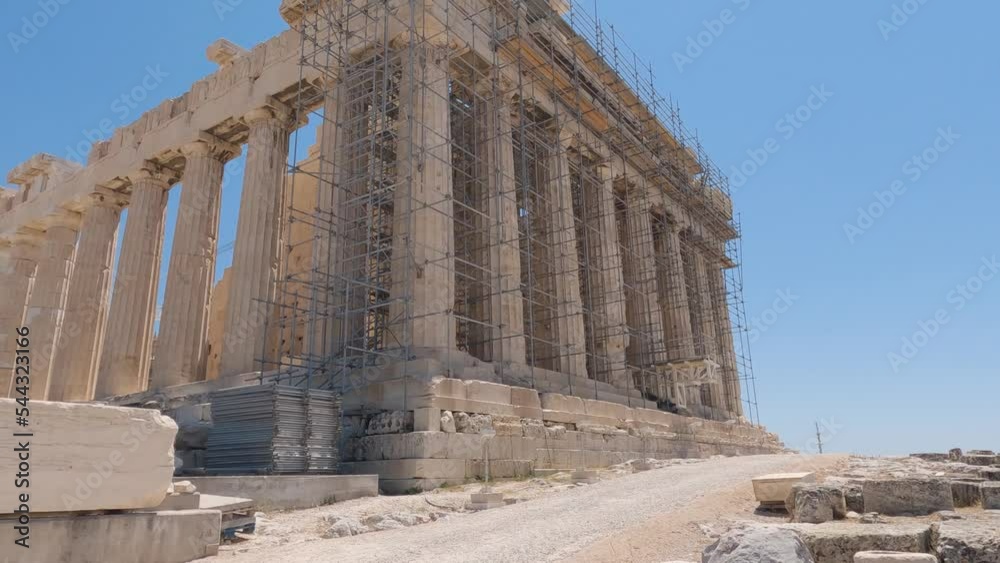 Restoration works on Parthenon, Historic temple in Acropolis of Athens, Scaffolding in the colums, Pan shot Restoration works on Parthenon, Historic temple in Acropolis of Athens, Scaffolding in the colums, Pan shot