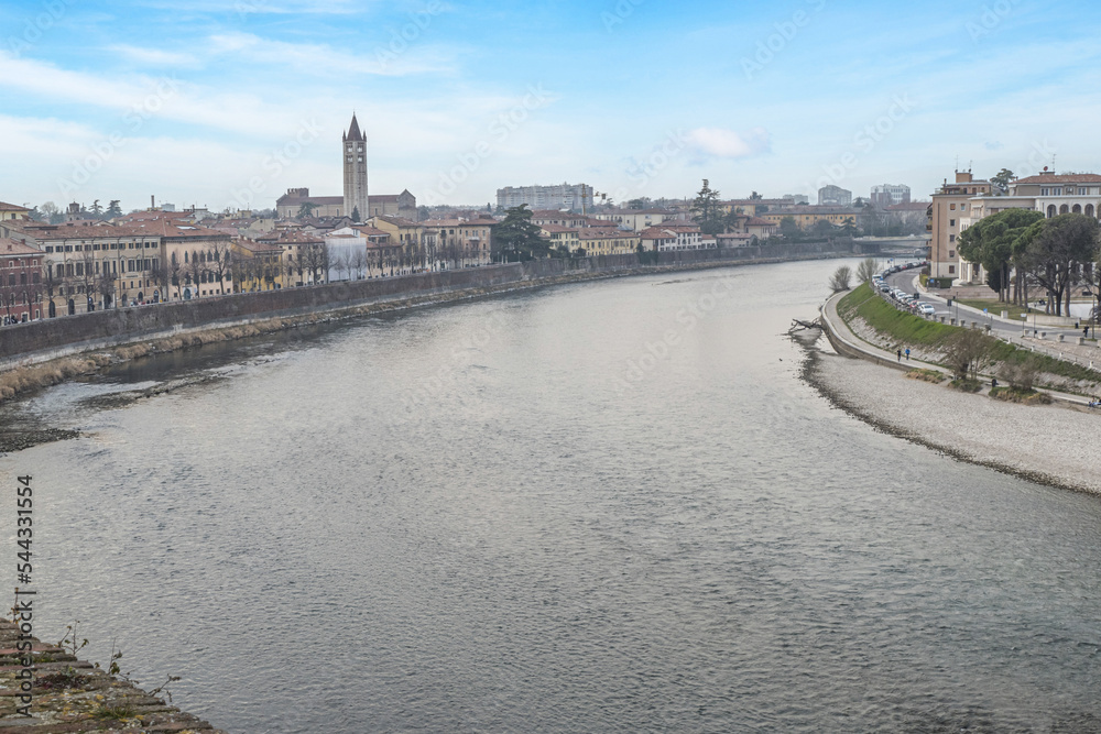 Fototapeta premium The Adige river and the panorama of Verona seen from the Castelvecchio bridge