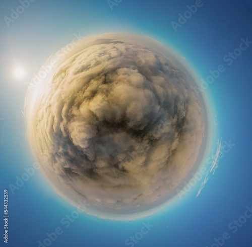 Fototapeta Naklejka Na Ścianę i Meble -  Tiny planet panorama from a 360 aerial view of above low clouds at sunrise. Cloudy earth with rising sun and blue sky.