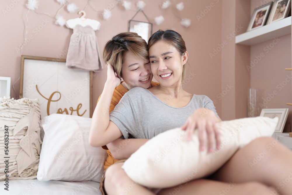 Asian lesbian couple, LGBTQ. Happy Two young Asia women showing love and romance together at home. Positive mood and moment of LGBT lesbian. Asian lesbian couple, LGBTQ. Happy Two young Asia women showing love and romance together at home. Positive mood and moment of LGBT lesbian.