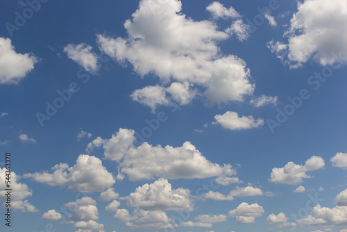 clouds in the sky lit by the sun on a summer day. background