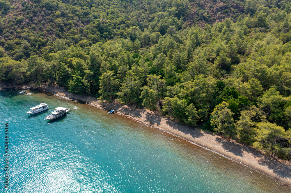 Turquoise sea and aerial view of boats at Ekincik bay. 