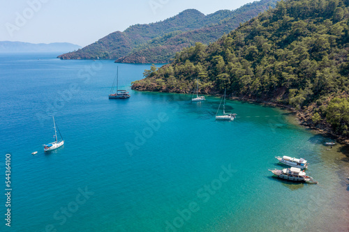 Turquoise sea and aerial view of boats at Ekincik bay. 