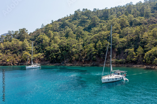 Turquoise sea and aerial view of boats at Ekincik bay. 