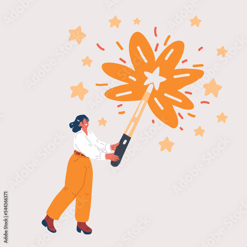 Playful young woman holding magic wand while standing against yellow background