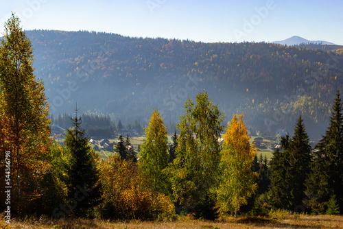 Beautiful autumn scenery. Fabulous autumn view of the mountain valley. Gorgeous morning scene of mountain village, Carpathians, Ukraine, Europe. Beautiful autumn scenery