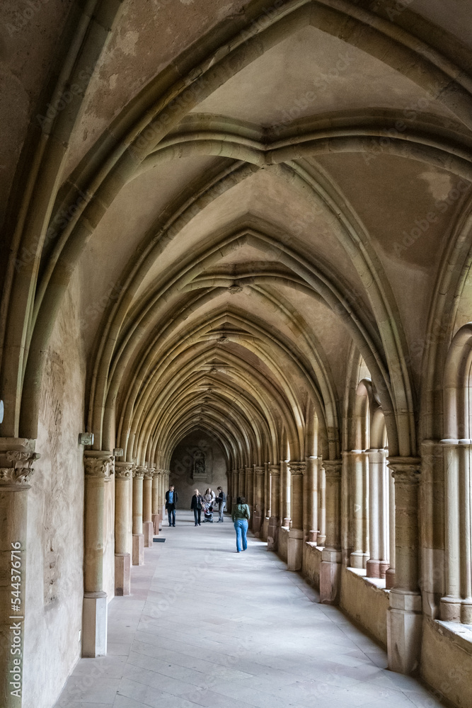 Nice view of the Gothic cloister corridor built between 1245 and 1270, connecting the famous Trier Cathedral to the Liebfrauenkirche (Church of Our Lady) in Trier, Germany.