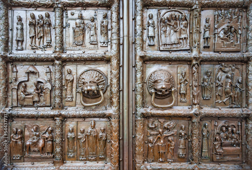 Magdeburg Gate is a Romanesque bronze gate of the middle of the XII century on the western side of St. Sophia Cathedral in Veliky Novgorod Magdeburg Gate is a Romanesque bronze gate of the middle of the XII century on the western side of St. Sophia Cathedral in Veliky Novgorod