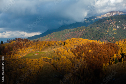 A charming mountain landscape in the Bucegi mountains, Carpathians, Romania. Autumn nature in Moeciu de Sus, Transylvania photo