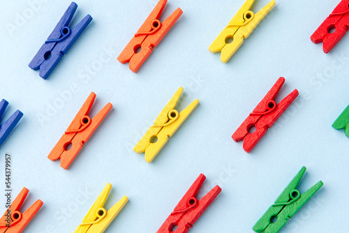 Group of objects, repetitive objects clothespin colorful pattern, crowd top view