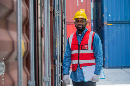 African American worker concept, African American worker working in warehouse containers for logistic import export