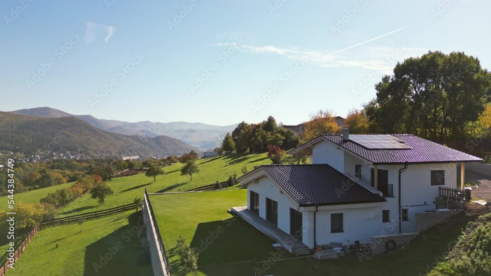 Photovoltaic panels on roof of eco house in nature. Photovoltaic panels on roof of eco house in nature.