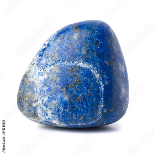 Mineral natural semiprecious stone lapis lazuli lazurite blue gemstone. Isolated on a white background. Geology. photo