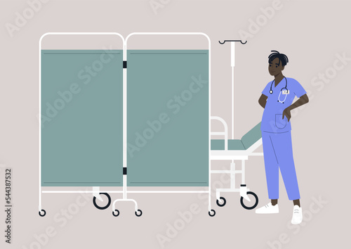 A hospital screen partition on wheels, a medical bed behind a room divider, a young doctor wearing a uniform