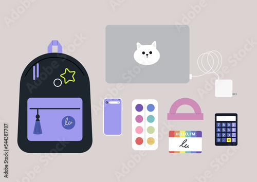 Back to school set, a backpack with pins, a laptop with charger, a mobile phone, and other stationery