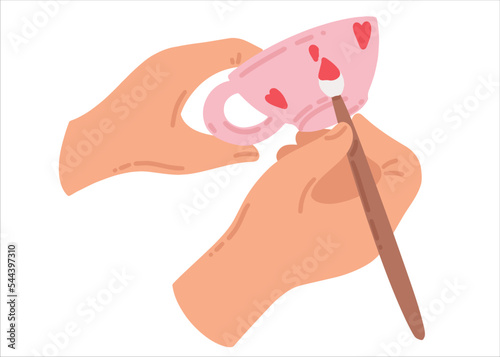 The potter's hands are painting a cup. Pink cup with red hearts. Ceramic dishes handmade. Pottery training. Vector illustration of hobby and creativity.