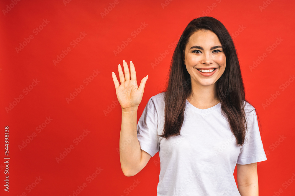 Portrait of happy smiling brunette business woman girl in casual isolated over red background. Portrait of happy smiling brunette business woman girl in casual isolated over red background.