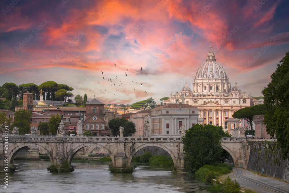 The beautiful and romantic view of St. Peter's Basilica in Vatican City and Ponte Vittorio Emanuel. One of the most famous tourist destinations in the world built between 1506 and 1626