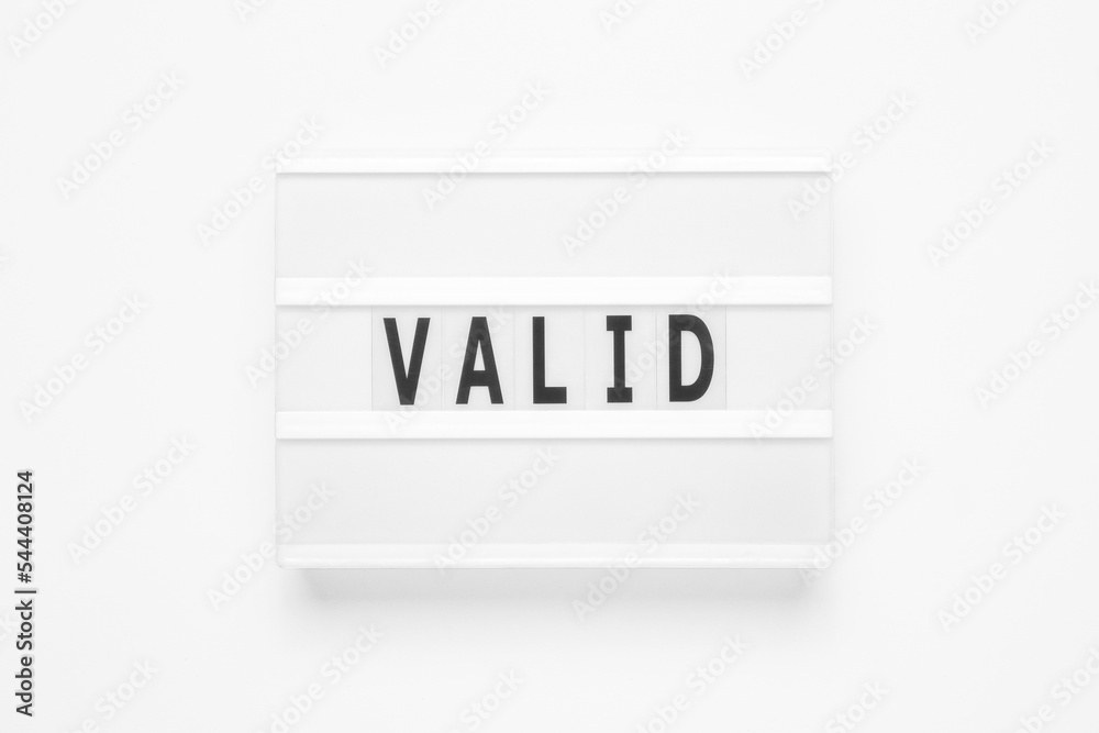Lightbox with word valid on white background Lightbox with word valid on white background