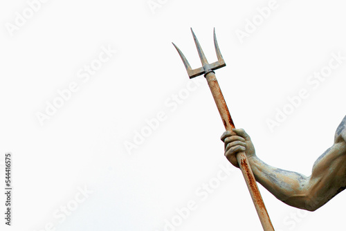  Neptun's (Poseidon, Triton). trident as symbol strength, power and unrestraint. Fragment of an ancient statue. Copy space. photo