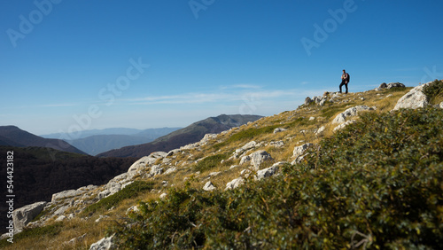 Hiker on the top of Orsello mountain, Campo Felice, L'Aquila, Abruzzo, Italy