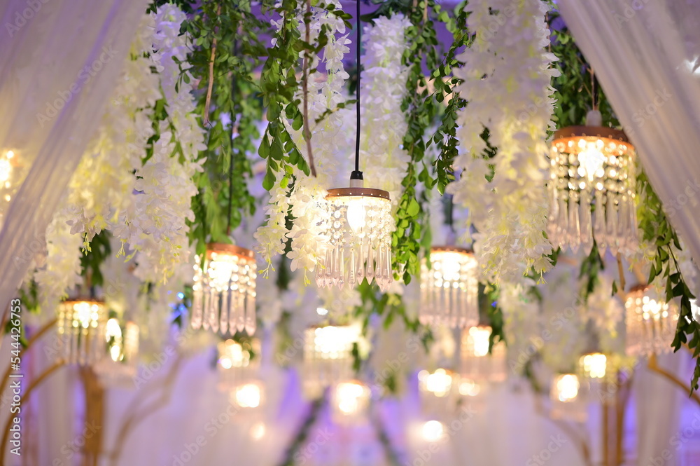 Elegant luxurious glass chandelier hanging from ceiling