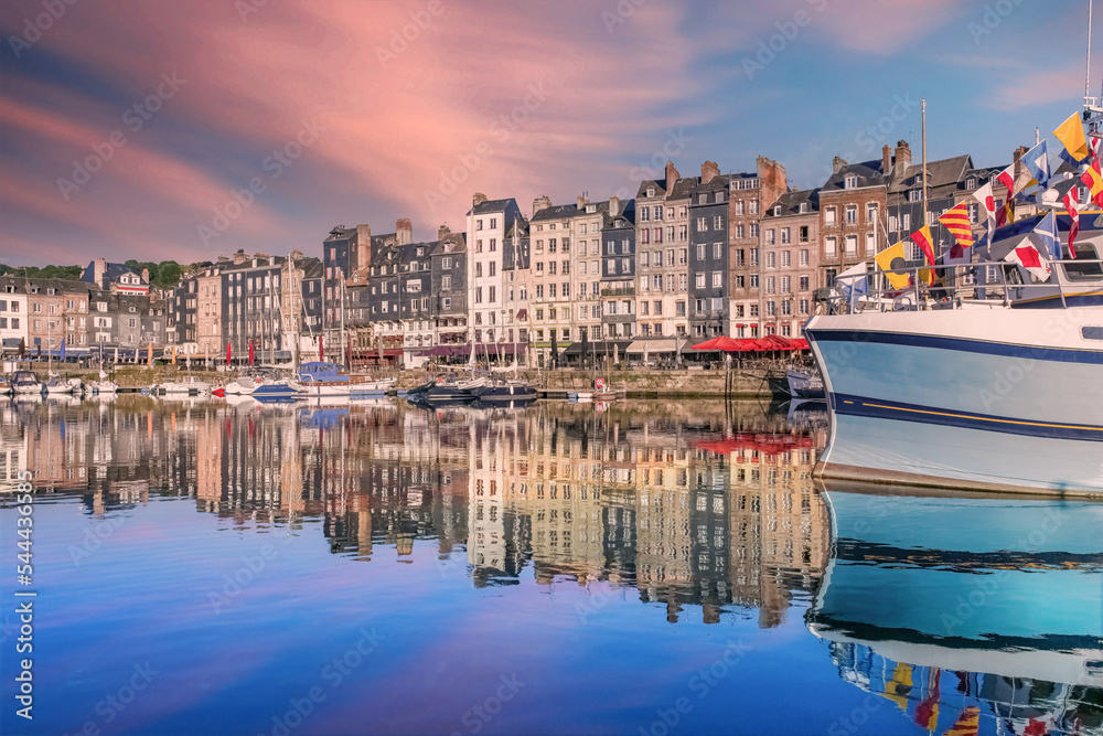 Honfleur, beautiful city in France, the harbor, houses on the quay 
