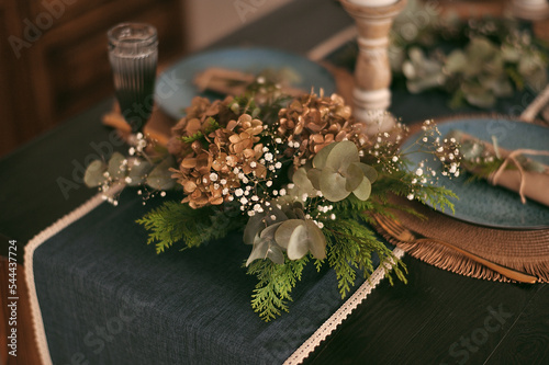 Stylish floral arrangement on the New Year's table