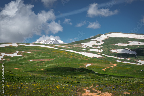 Beautiful view of Mount Oshten with snow. photo