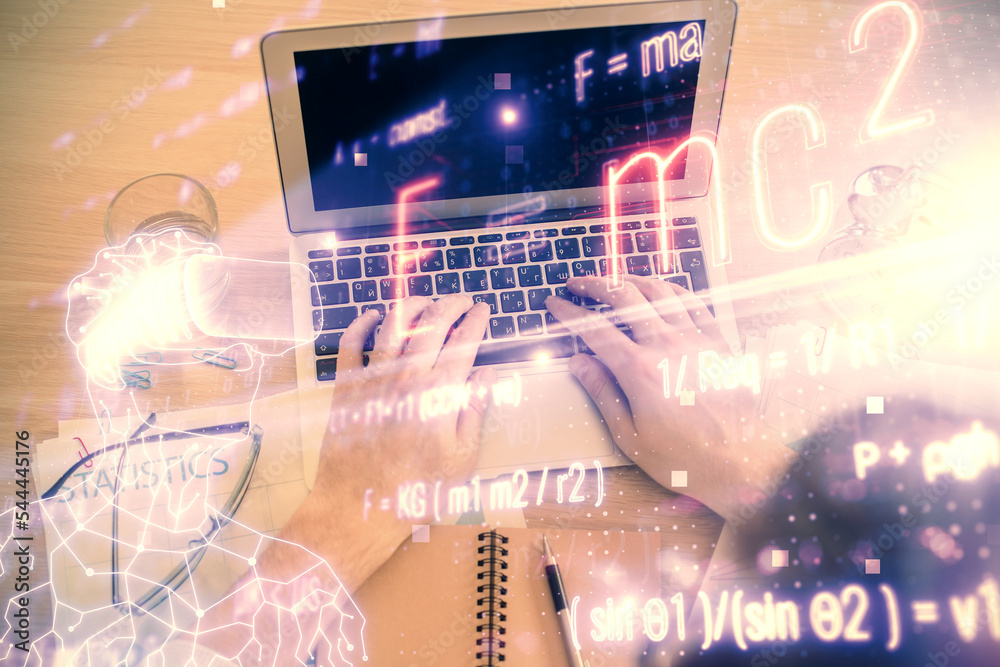 Double exposure of man's hands typing over computer keyboard and formula hologram drawing. Top view. Education concept. Double exposure of man's hands typing over computer keyboard and formula hologram drawing. Top view. Education concept.