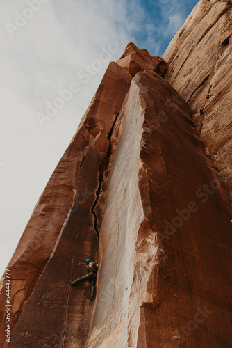 Woman climbing in indian creek moab utah  photo