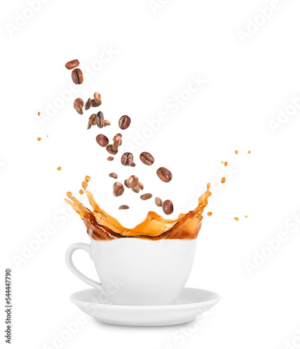 A cup of coffee with splashes, coffee beans flying into the cup, on a white background.