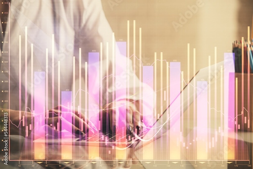 Double exposure of woman hands typing on computer and forex chart hologram drawing. Stock market invest concept. © peshkova