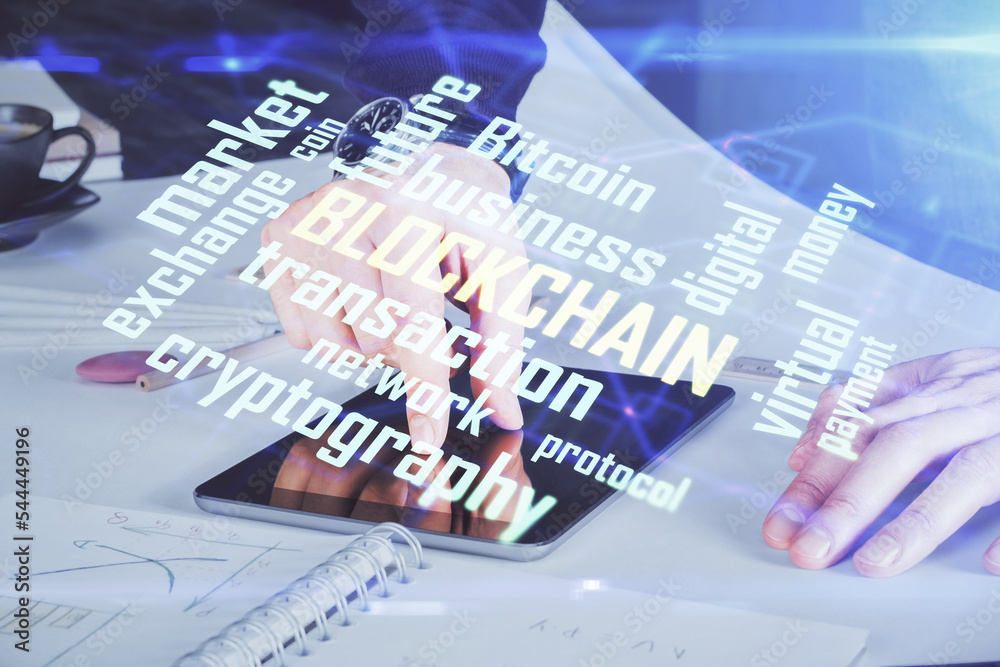 Fototapeta premium Double exposure of man's hands holding and using a phone and crypto currency blockchain theme drawing.