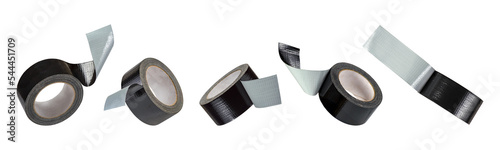 Big set roll of black adhesive tape isolated on white background. Reinforced black duct tape falls, casting a shadow. Unwound roll of electrical tape