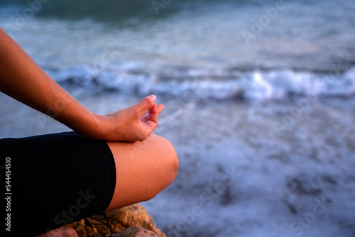 Woman practicing meditation and yoga outdoor