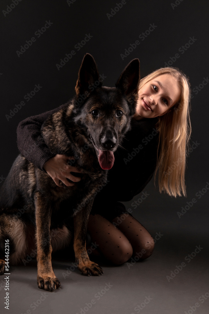 Young woman with german shepherd dog