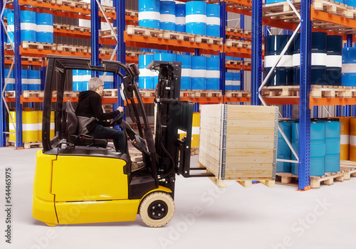 Forklift in logistics cente...