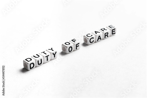 Phrase Duty of Care that means  a requirement that a person act toward others with the watchfulness, attention, caution and prudence