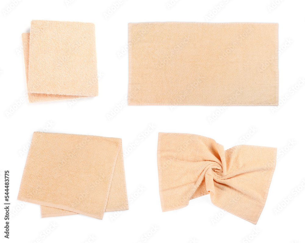 Set with soft terry towels on white background, top view Set with soft terry towels on white background, top view