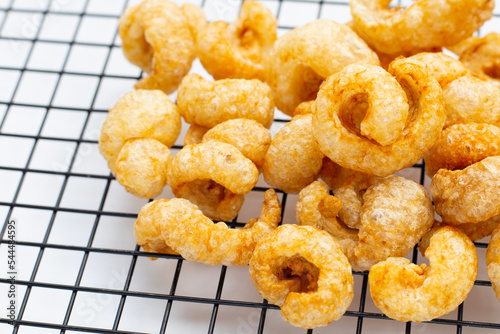 Crispy pork rinds or pork snack.